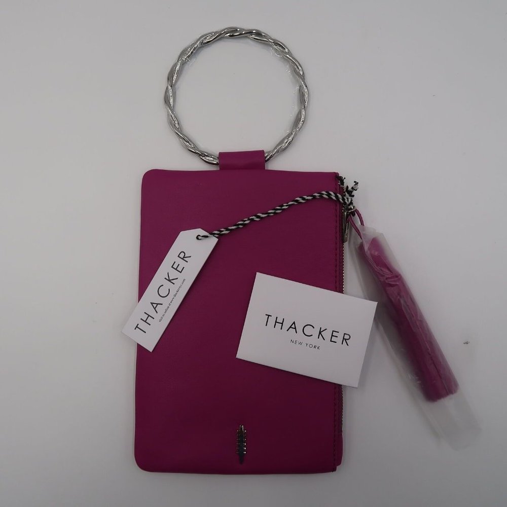 NEW THACKER NOLITA LEATHER CLUTCH WITH TWISTED RING HANDLE & TASSEL FUCHSIA 43
